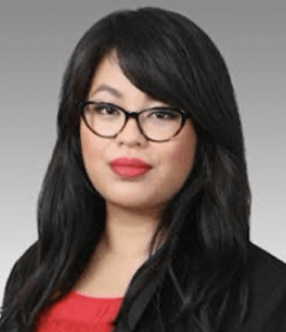 Image of Michelle Yuen, a woman wearing glasses.