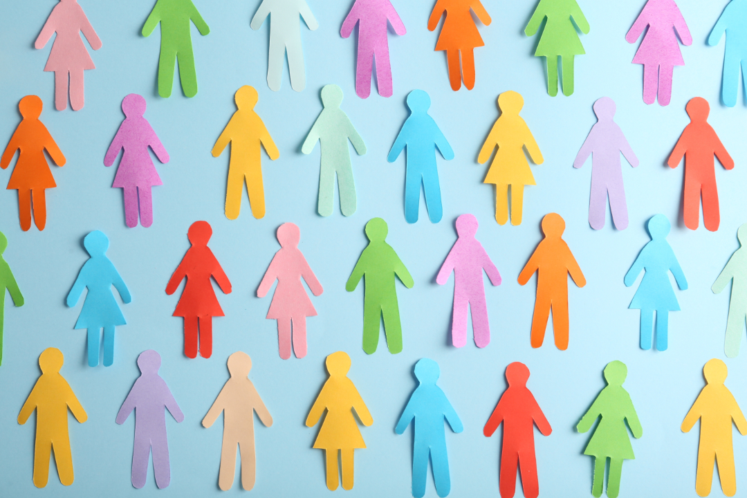 Many different paper human figures on light blue background, flat lay. Diversity, Equity, and Inclusion in the Workplace Webinar from the Corporate Class INC